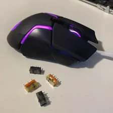 Computer Mouse with Spare Buttons next to it