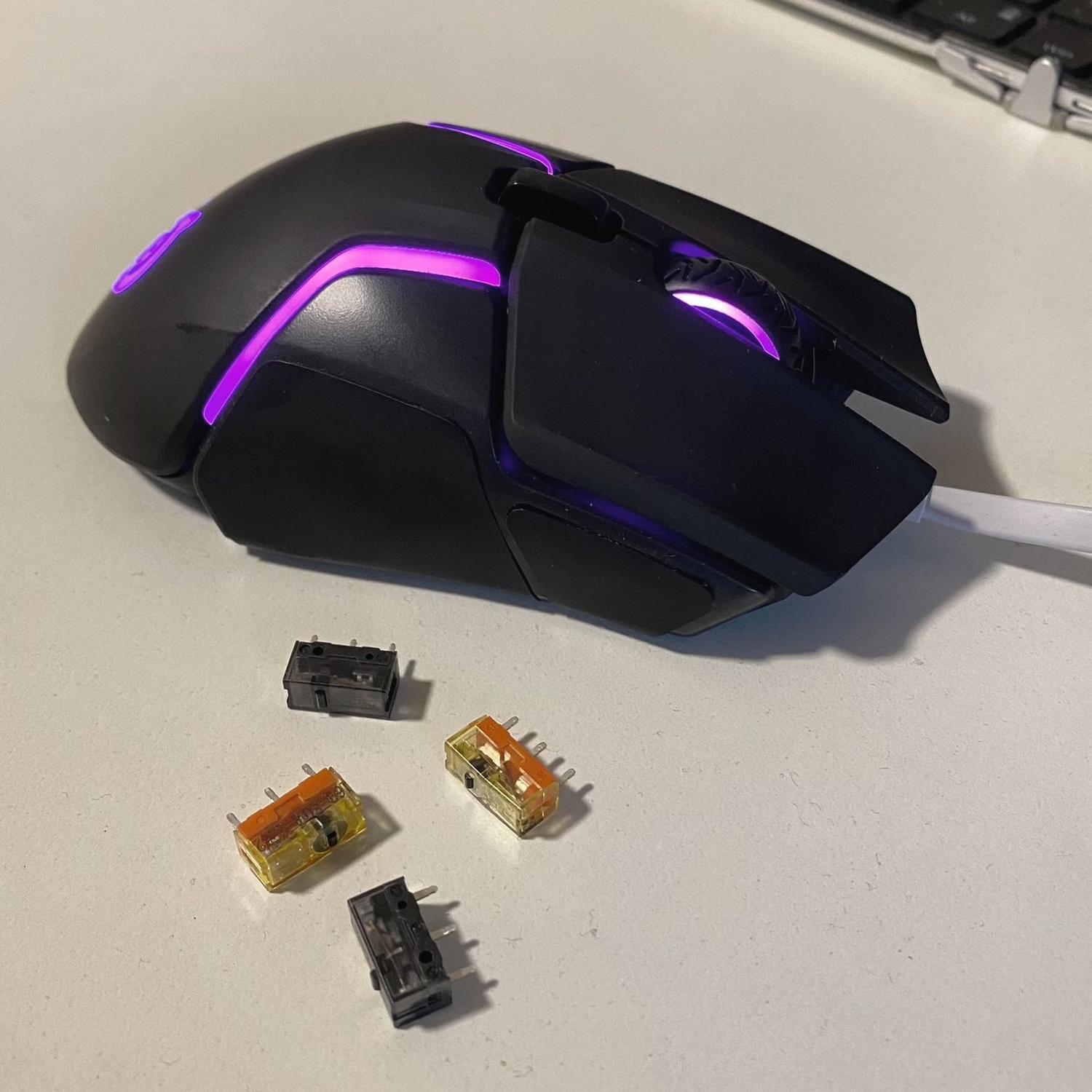 The mouse in questions with some spare switches